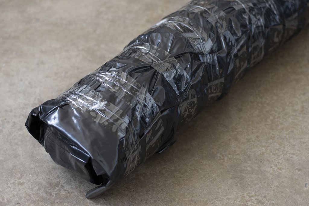 An oriental rug prepped and wrapped for cross-country shipping