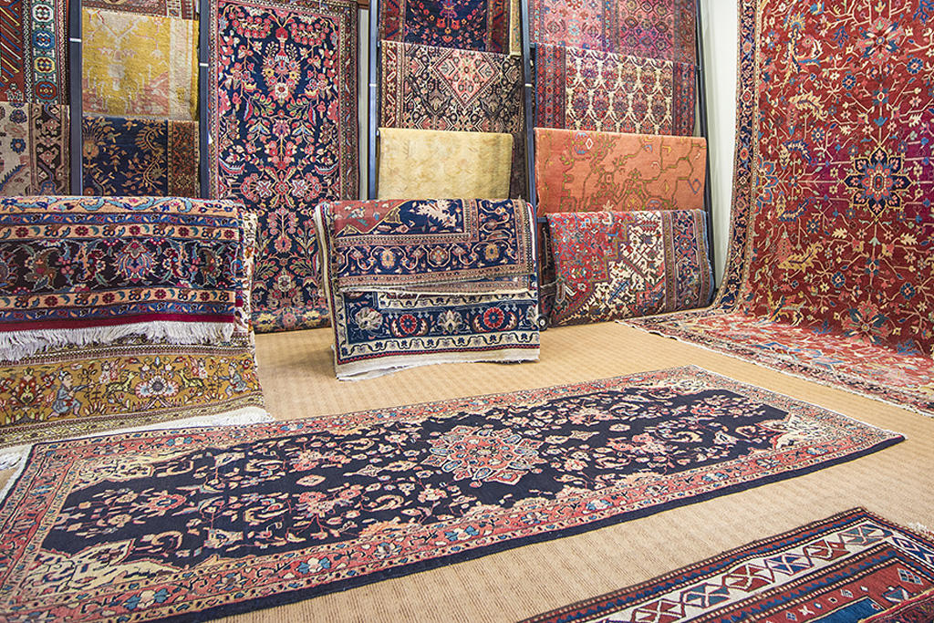 Aladdin Rug gallery with numerous hangin rugs