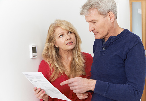 Couple looking at energy bill