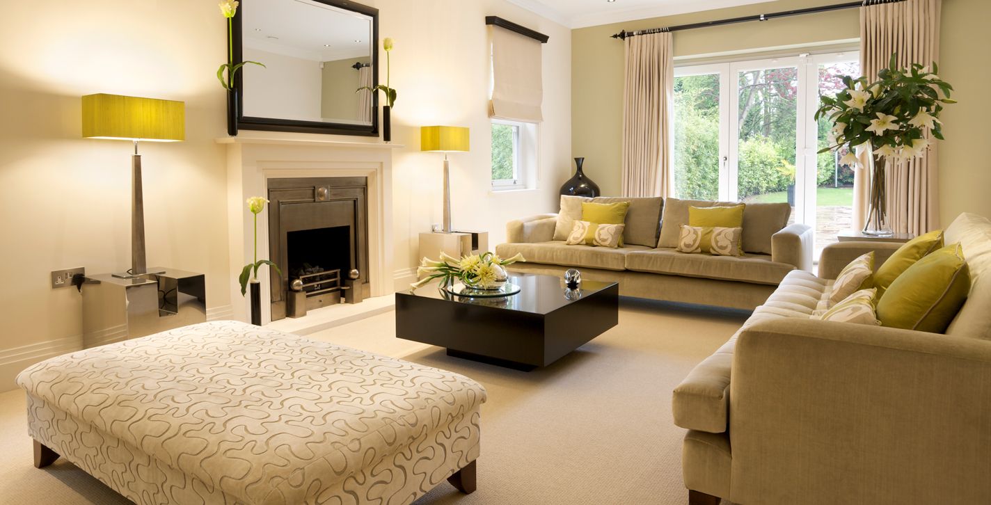 professional-upholstery-cleaning A living room with expensive upholstered couches and drapes that have been professionally cleaned