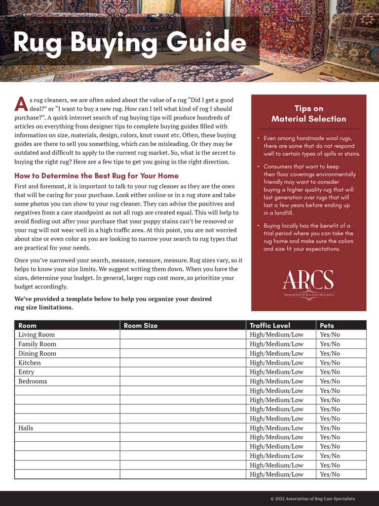 Aladdin employee cleaning a carpet with a tool.