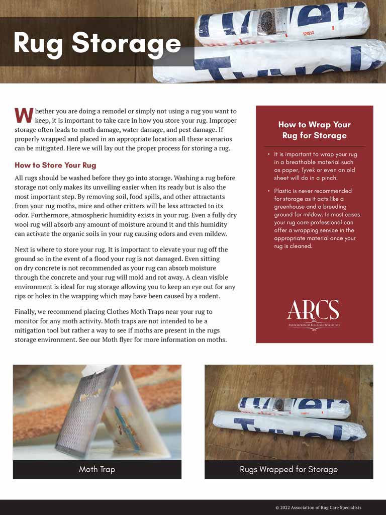 An Aladdin employee cleaning a wooden floor with tool.