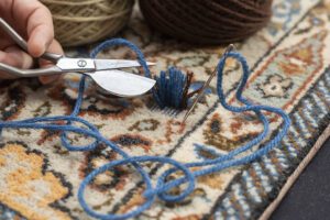 Antique rug reweaving