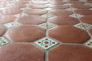 Dull coloring on Saltillo tile that needs professional cleaning